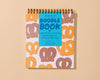 Letterpress Unlined Spiral Notebook—Soft Pretzel (Philly, NYC)-Spiral Notebooks: Doodlebook-And Here We Are