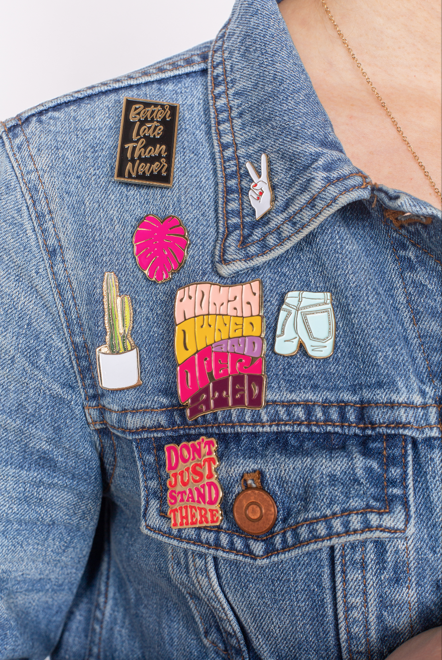 Personalize your jean jacket with buttons and enamel pins.